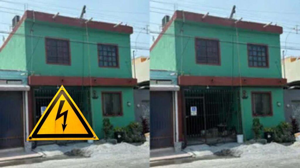 Casa verde de dos pisos duplicada en la imágen dos veces. Hay una señal de peligro de electrocución